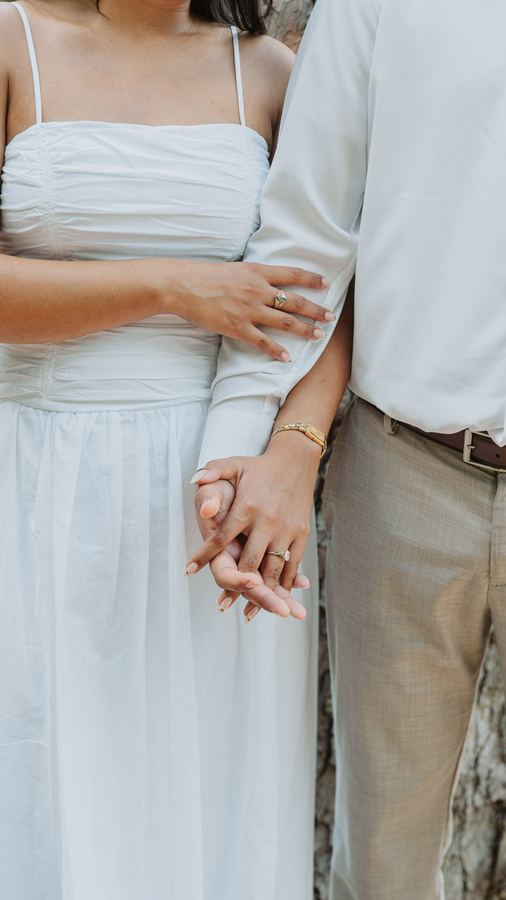 Close detail of their hands together