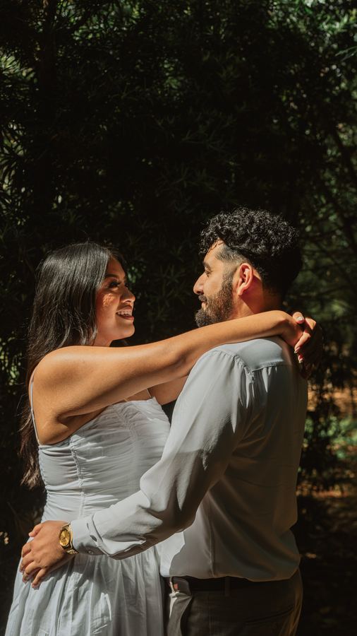 Jasmin and Edgar embracing and smiling